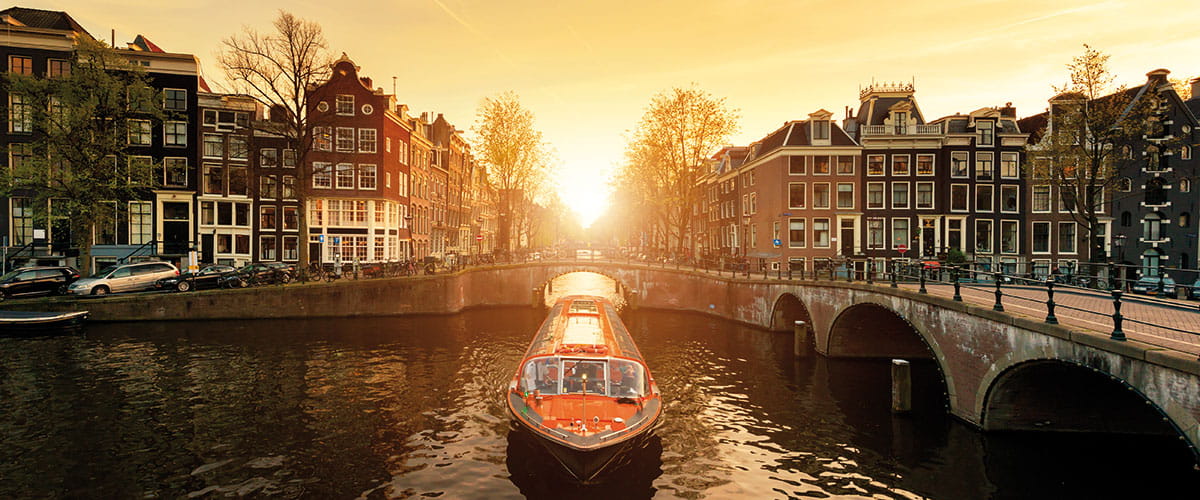 Sunset over an Amsterdam canal